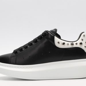 ALEXANDER MCQUEEN Black calf leather lace-up sneaker with silver-finished hammered stud