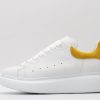 ALEXANDER MCQUEEN oversized sneakers with yellow heel