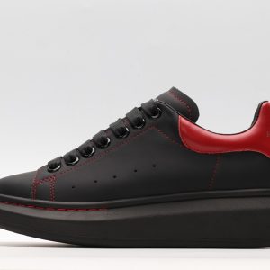 ALEXANDER MCQUEEN black oversized sneakers with red heel