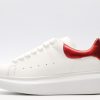 ALEXANDER MCQUEEN oversized sneakers with red heel