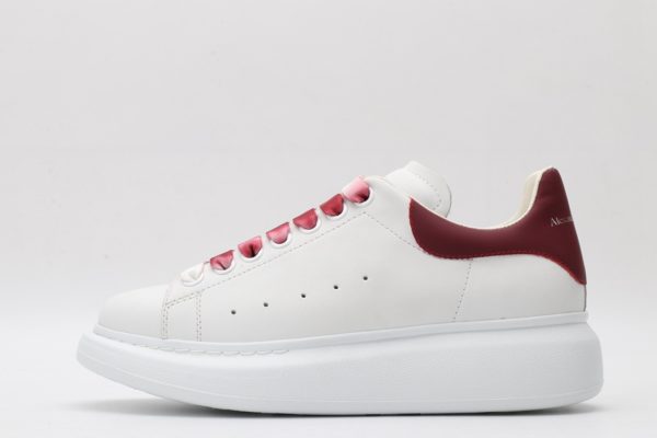 ALEXANDER MCQUEEN oversized sneakers with red heel